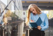 portrait-attractive-woman-with-mobile-phone-city-street_73504-116-7206429