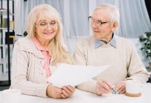 senior-couple-doing-paperwork_23-2148014576-8235412